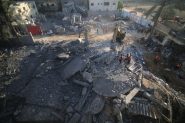 A search for survivors takes place among the rubble of a building destroyed in Israeli airstrikes in the southern Gaza Strip city of Rafah, on October 16 2023