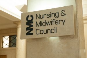 A sign that reads NMC Nursing and Midwifery Council