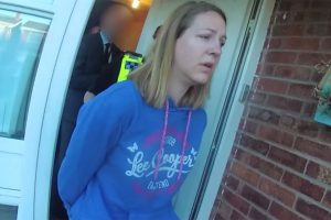 Lucy Letby exits her home as she is arrested in 2018